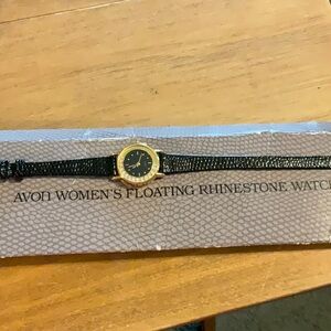 Genuine Vintage 1991Avon Gold tone rhinestoned bezel Case Watch with Black Strap